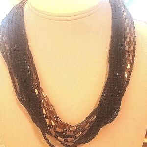 Seed necklece black color gold 13 strand
